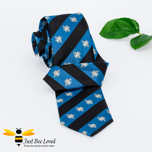 Navy and blue diagonal striped neck tie with grey embroidered bees design