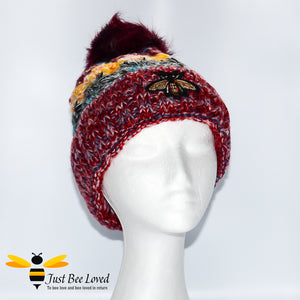 Ladies thick knitted burgundy wool hat with large bumblebee embroidery
