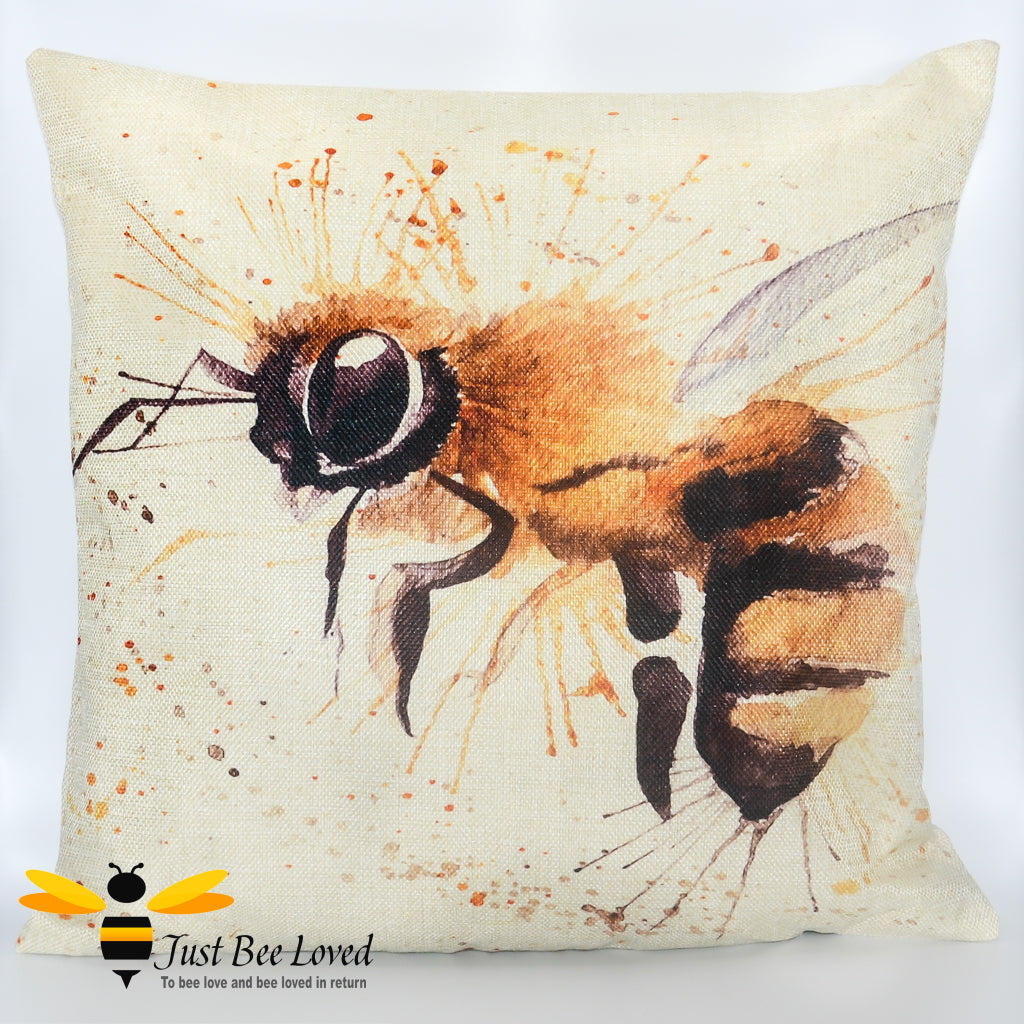 Scatter cushion featuring a watercolour image of a honey bee against splash background