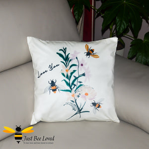Soft and luxurious to the touch, large scatter cushion featuring embroidered design image of bumblebees and flowers with "Love You" text.