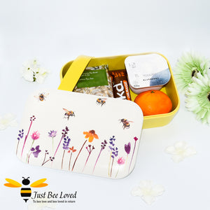 Bento bamboo eco friendly lunch box from the Jennifer Rose Busy Bees Collection from Leonardo.  Featuring a design of flying bumblebees in a field of flowers.