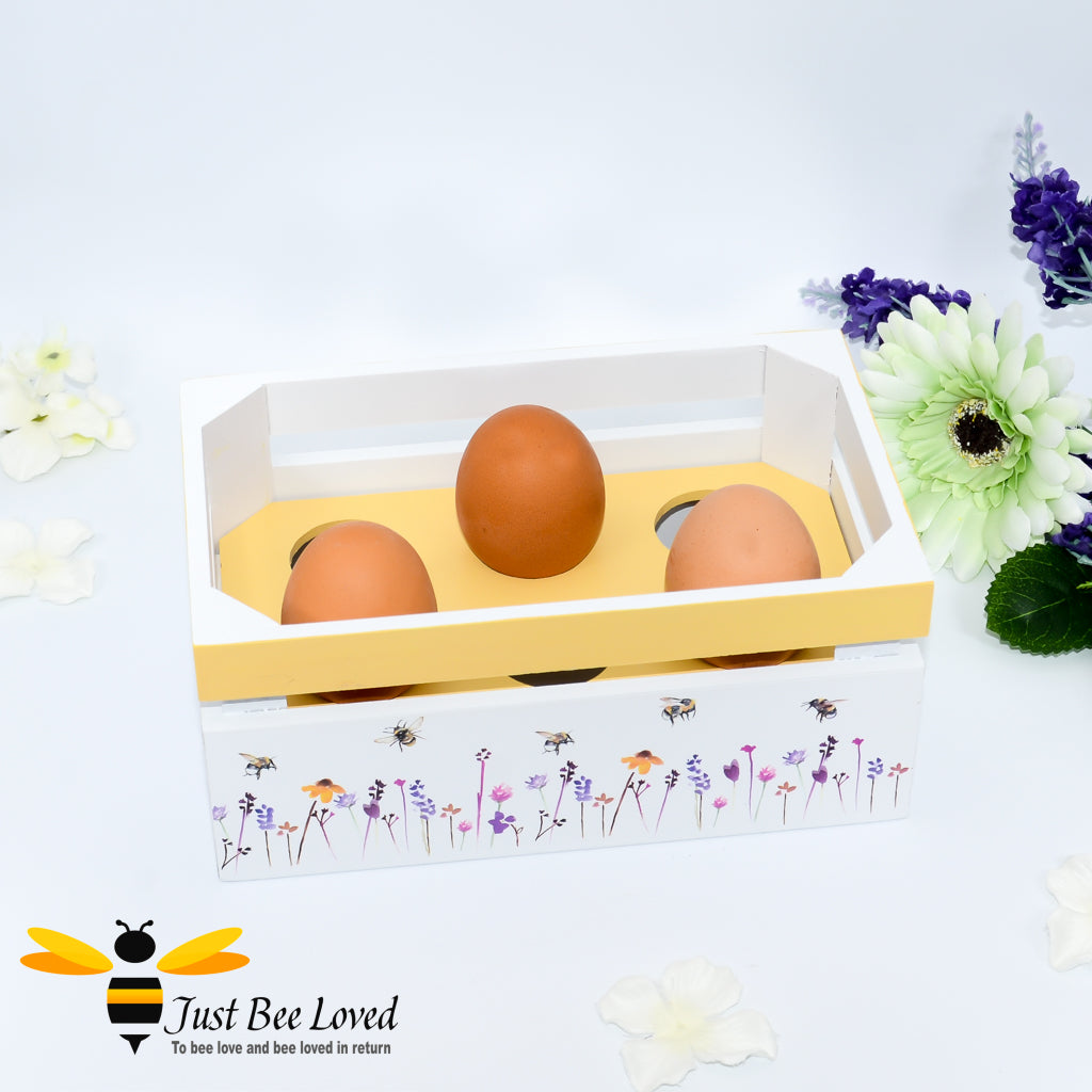 Egg crate from the Jennifer Rose Busy Bees range; featuring a watercolour design of flying bumblebees in a field of flowers.  