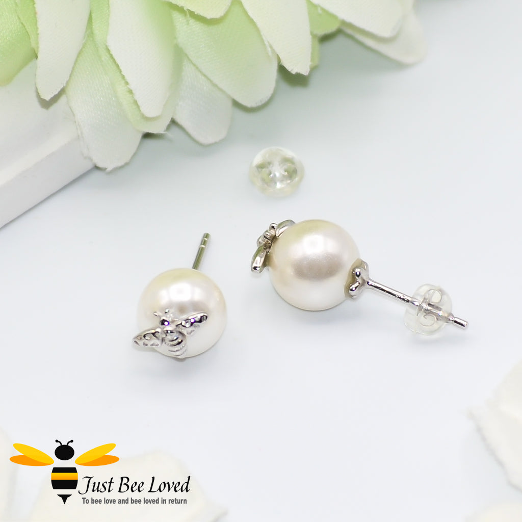 White pearl and bee sterling silver 925 stud earrings nose studs featuring pearls and silver bee design