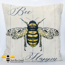 Load image into Gallery viewer, Large scatter cushion featuring a classic design of a golden bee amongst beautiful navy colour calligraphy and the joyful message &quot;Bee Happy&quot; in creamy beige colour.