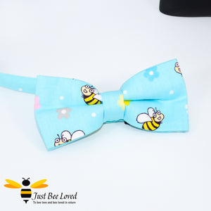 Men's novelty bee themed pre-tied cotton bow ties with bees in blue.