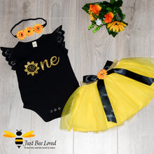 Load image into Gallery viewer, baby girl bee inspired tutu 3-piece party dress.  Featuring a black lattice short sleeved romper with a golden sunflower, fully lined yellow tutu skirt and matching sunflower headband.