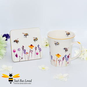 Jennifer Rose Mug & Coaster gift set featuring the Busy Bees watercolour design of bumblebees flying in a field of flowers.
