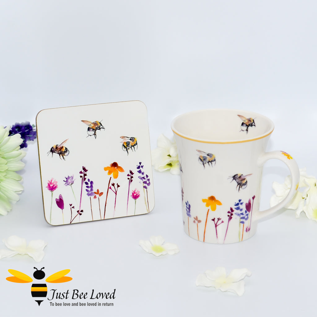 Jennifer Rose Mug & Coaster gift set featuring the Busy Bees watercolour design of bumblebees flying in a field of flowers.