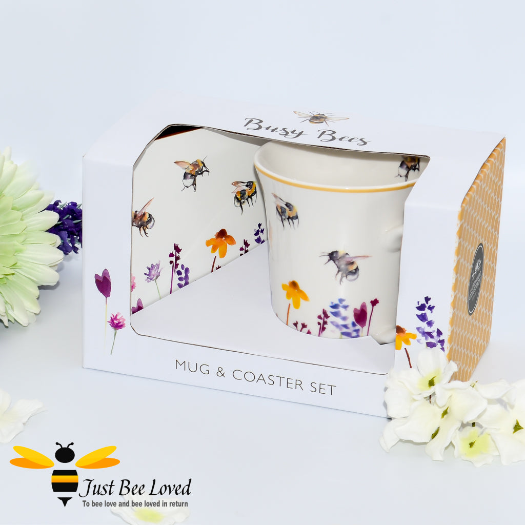 Jennifer Rose Mug & Coaster gift set featuring the Busy Bees watercolour design of bumblebees flying in a field of flowers.