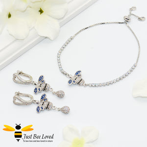 Handmade rhinestone encrusted sliding bee bracelet with matching bee drop earrings.