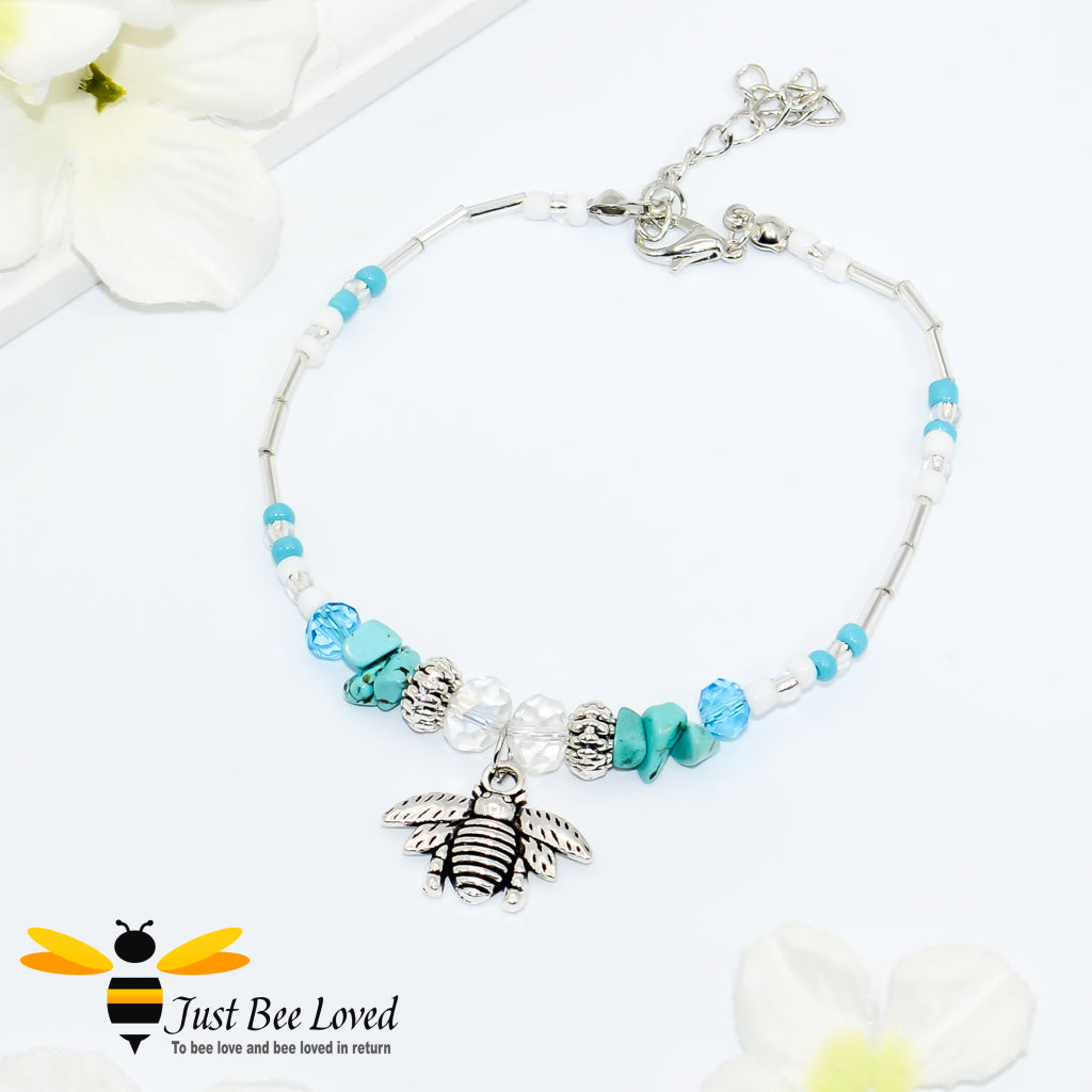 bohemian styled anklet bracelet featuring a bee pendant, turquoise stones and white beads