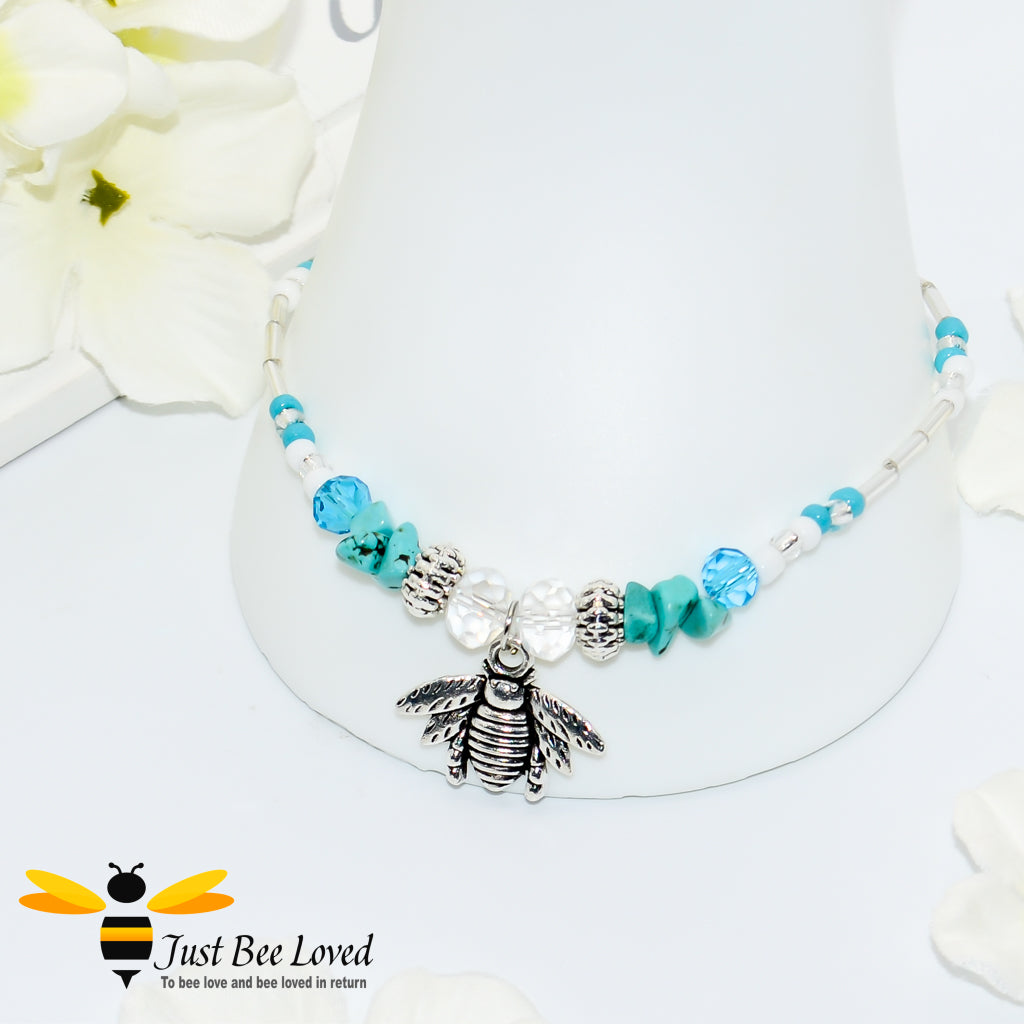bohemian styled anklet bracelet featuring bee pendant, turquoise stones and white tube beads