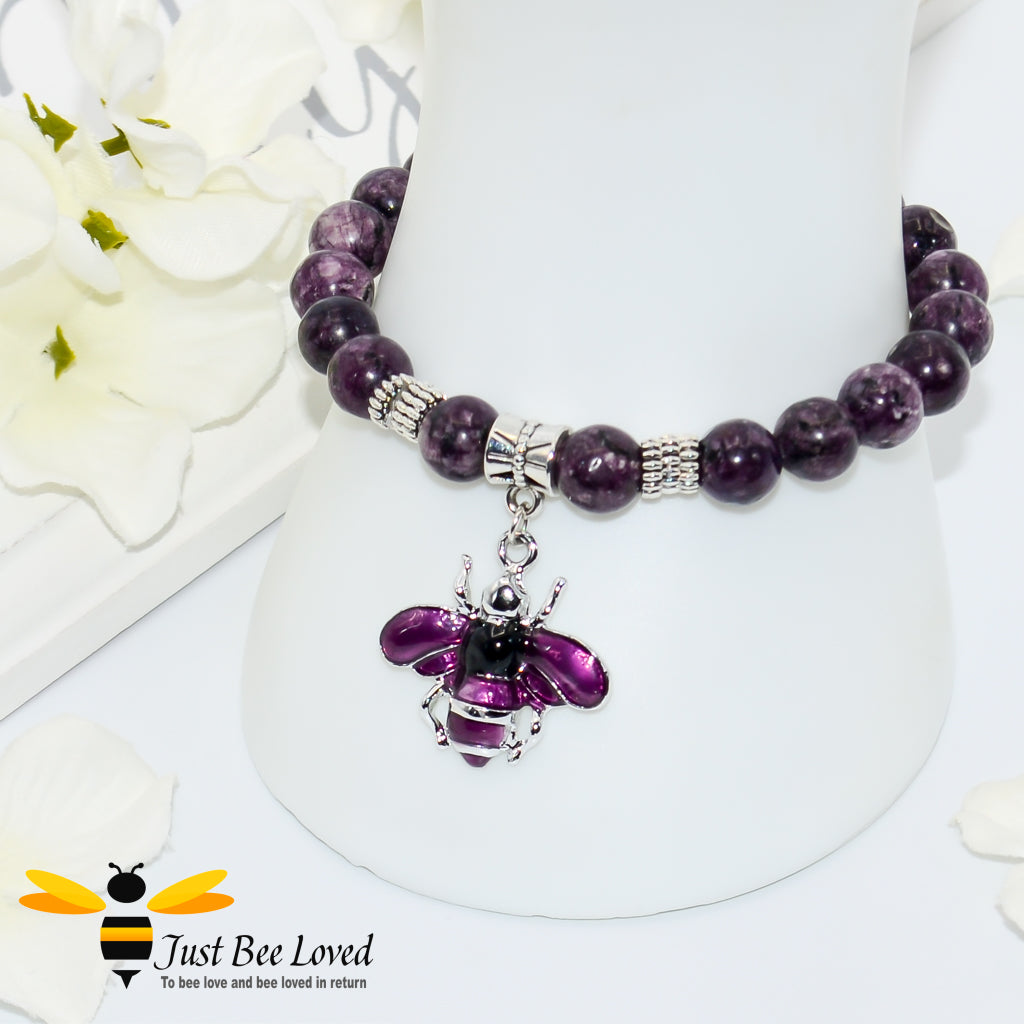 Handmade mottled purple natural stone bead bracelet featuring a purple enamelled bee charm. 