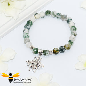Handmade mottled green natural stone bead bracelet featuring silver bee charm. 