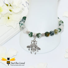 Load image into Gallery viewer, Handmade mottled green natural stone bead bracelet featuring silver bee charm. 