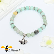 Load image into Gallery viewer, green bead bracelet featuring antique silver bee charm pendant. 