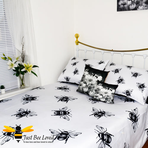 duvet bedding set featuring a bold black and white design print of large bees with matching pillow cases.