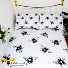 Load image into Gallery viewer, duvet bedding set featuring a bold black and white design print of large bees with matching pillow cases.