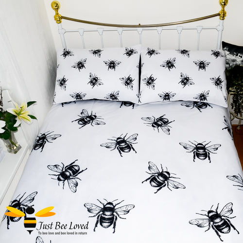 duvet bedding set featuring a bold black and white design print of large bees with matching pillow cases.