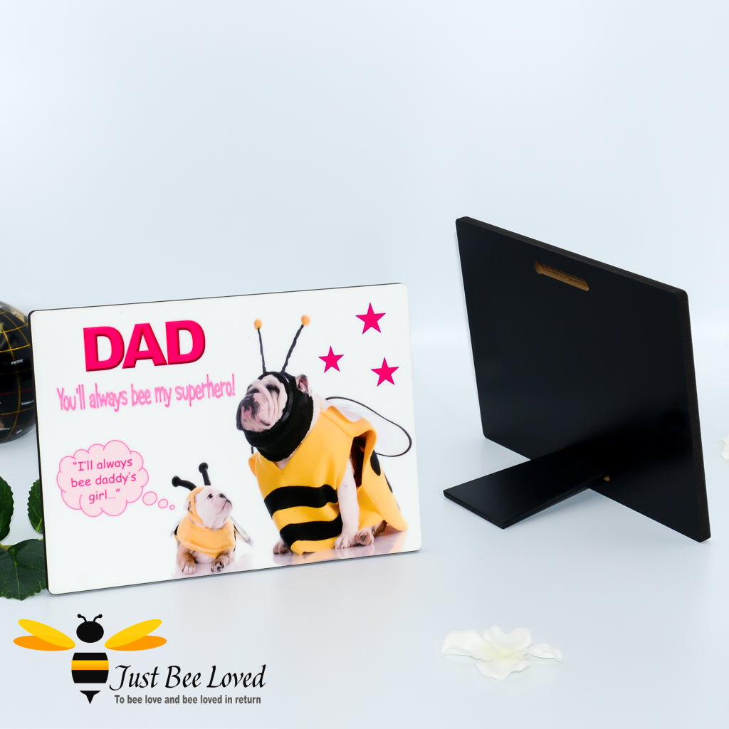 Freestanding desk plaque with 'DAD you'll always bee my superhero' text, showing a puppy bulldog looking up at a daddy bulldog, both dressed in bee costumes.