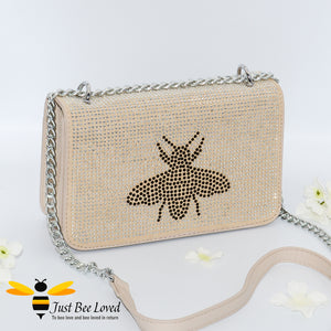 Beige faux leather handbag encrusted with thousands of hand-painted crystal diamantes and featuring a large central bee