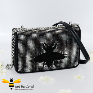 Black faux leather handbag encrusted with thousands of hand-painted crystal diamantes and featuring a large central bee