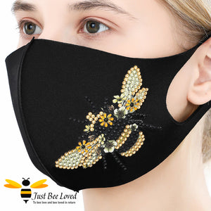 Woman wearing a 3D diamond painting bumblebee face-mask