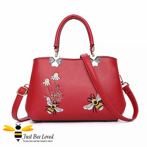 Hand embroidered bumblebees flowers faux leather handbag in red colour