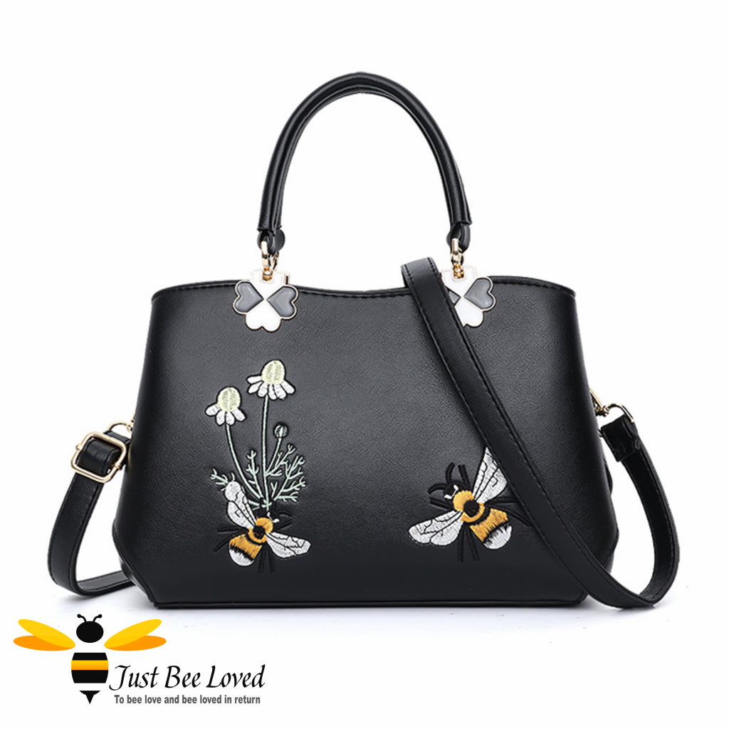 Hand embroidered bumblebees flowers faux leather handbag in black colour