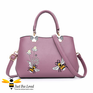 Hand embroidered bumblebees flowers faux leather handbag in mauve colour