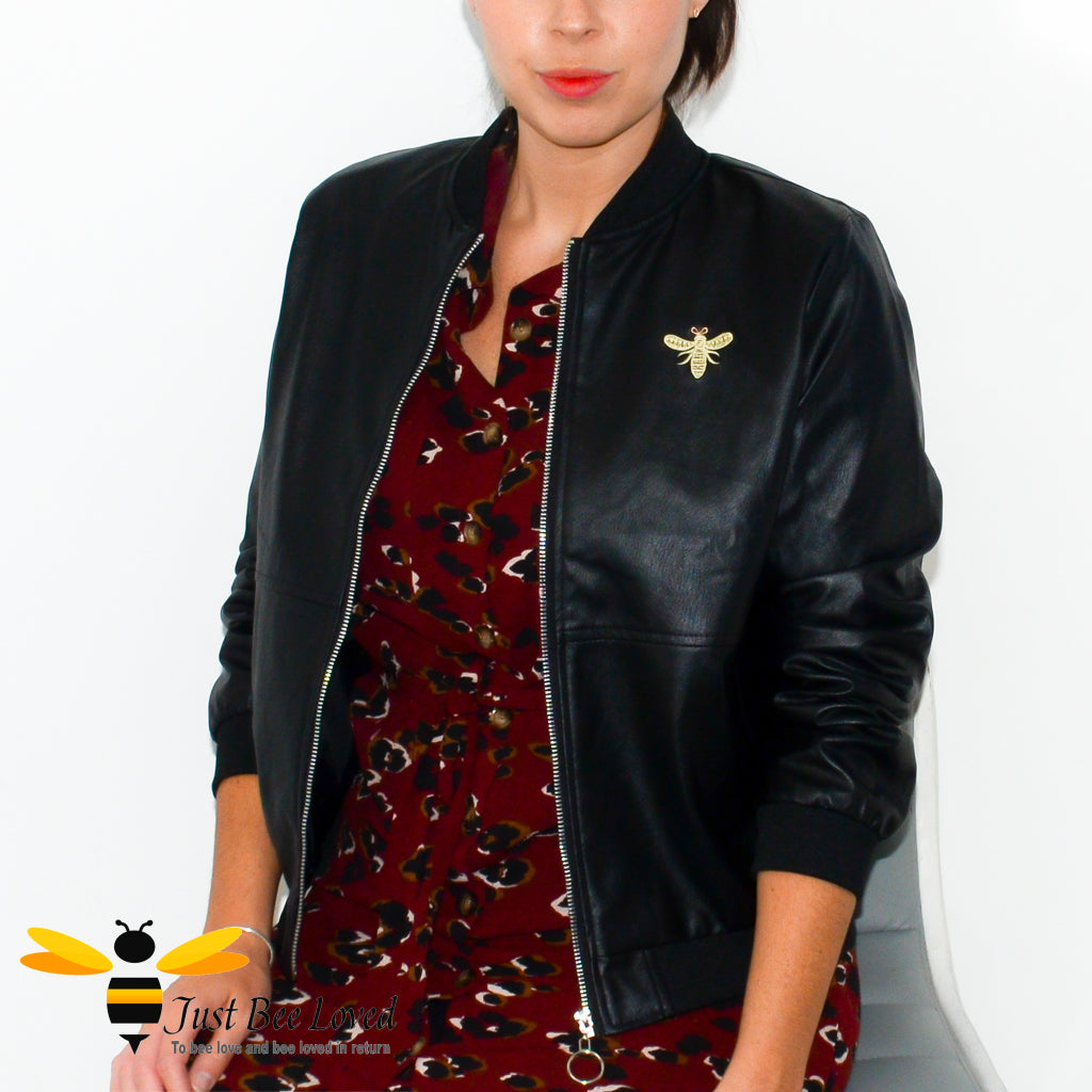 Women's faux vegan friendly leather black biker bomber baseball jacket featuring bee embroidery detailing