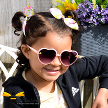 Load image into Gallery viewer, Little girl wearing pink heart shape bee sunglasses