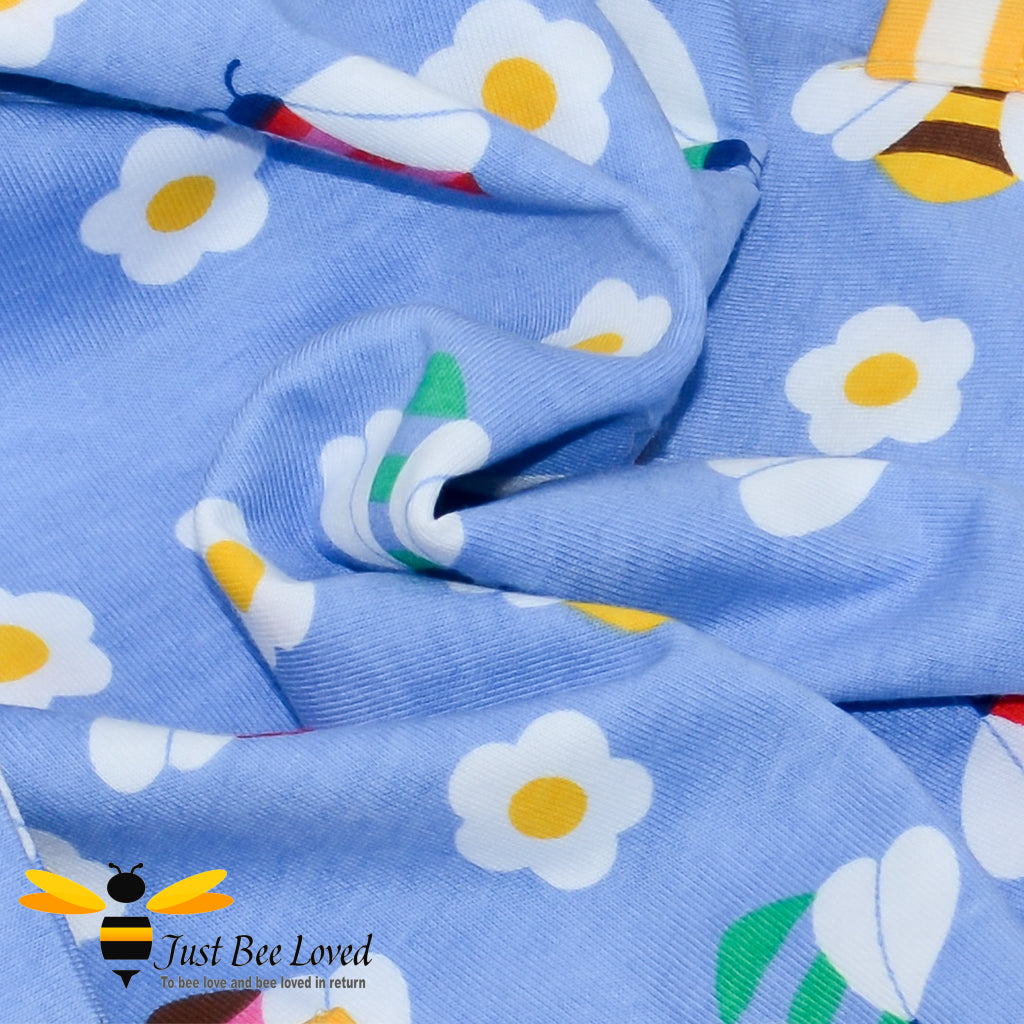 long sleeved thick cotton dress featuring an all over print of colourful bees.