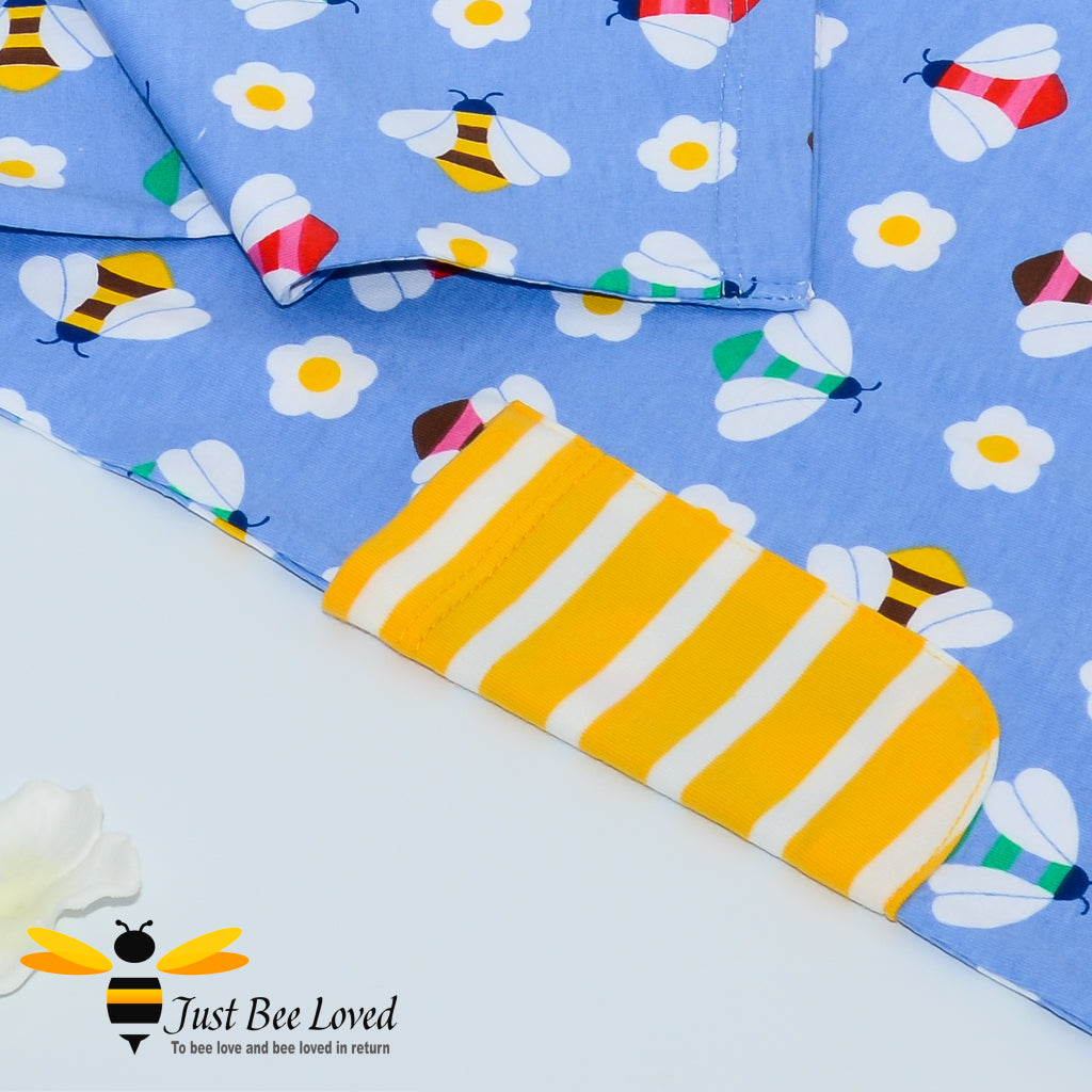 long sleeved thick cotton dress featuring an all over print of colourful bees.