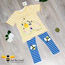 Load image into Gallery viewer, Girl&#39;s summer yellow striped T-shirt embroidered with honey bees, beehive and pretty flowers.