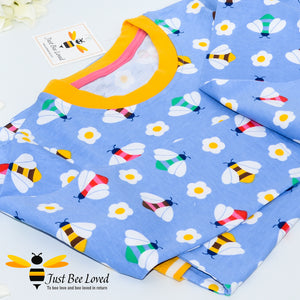 long sleeved thick cotton dress featuring an all over print of colourful bees.
