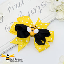Load image into Gallery viewer, ribbon bow hair clip featuring a bumblebee on a pre-tied black and yellow &amp; white polka dot double bow.