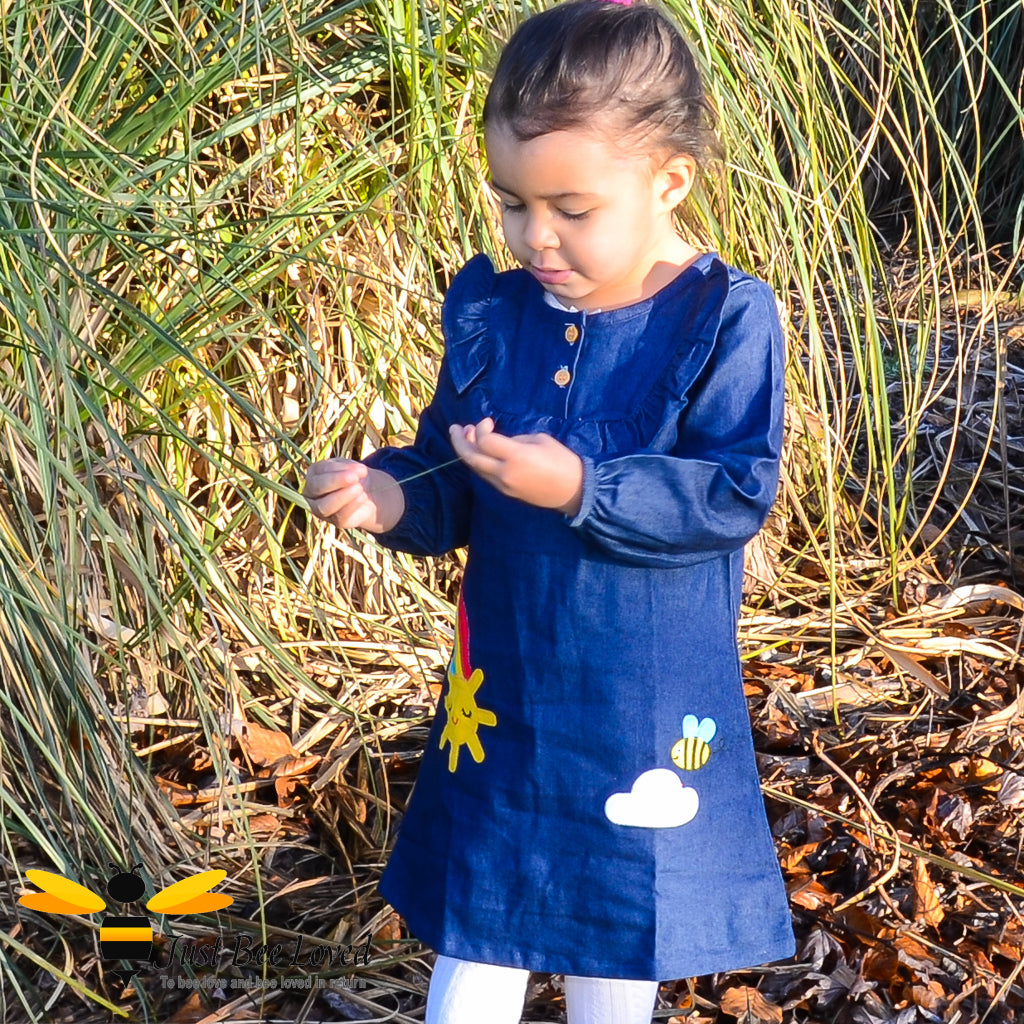 Girl's denim dress with a bumblebee
