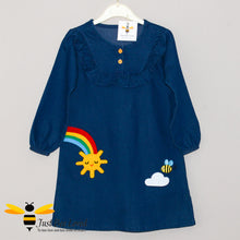 Load image into Gallery viewer, denim long sleeved square neckline ruffle dress featuring adorable applique bumblebee and smiling rainbow sun