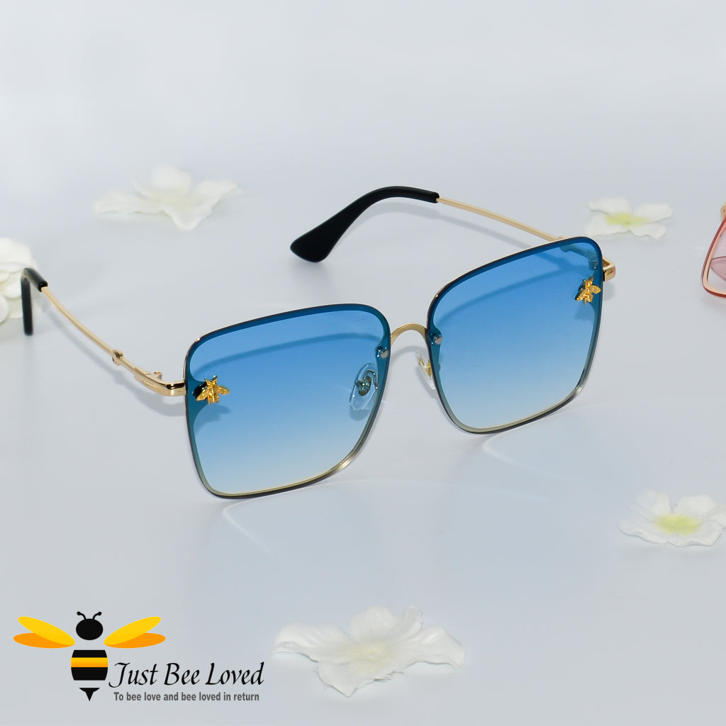 Square rimless bee sunglasses in blue lens colour