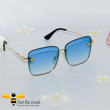Load image into Gallery viewer, Square rimless bee sunglasses in blue lens colour