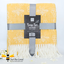 Load image into Gallery viewer, acrylic woollen throw blanket in pastel yellow featuring an all over honey bee &amp; honeycomb design with fringe border