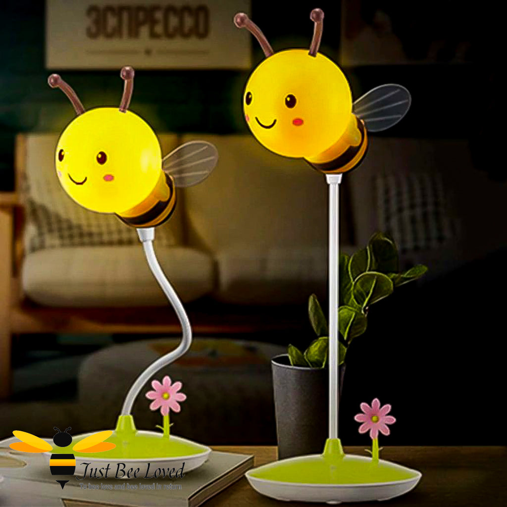 A children's honey bee night light lamp in yellow and green, shaped like a bee with a round body and wings.