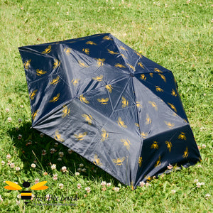 Black foldable mini umbrella with gold bees print