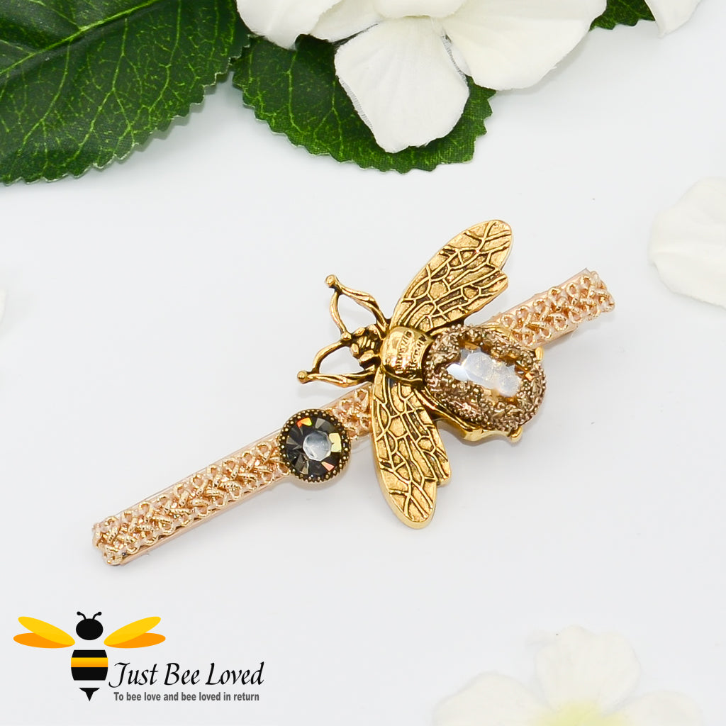 Large gold colour metal hair clip with jewelled bee