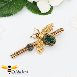 Large gold colour metal hair clip with emerald jewelled bee