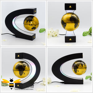 C shaped Floating levitation anti gravity black and gold globe desk lamp featuring two matching gold bees.