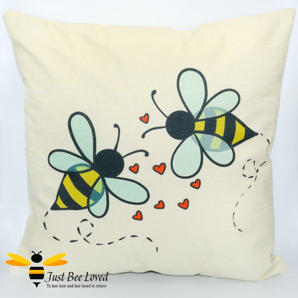 cushion featuring two bumblebees with love-hearts