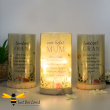 Load image into Gallery viewer, table tube lamps featuring a sentimental tribute to either a &quot;wonderful mum&quot;, &quot;loveliest gran&quot; or &quot;loveliest friend&quot; each with an accompanying heartfelt verse, flowers and bees.
