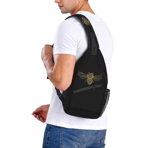 Men's black sling backpack with gold bee print